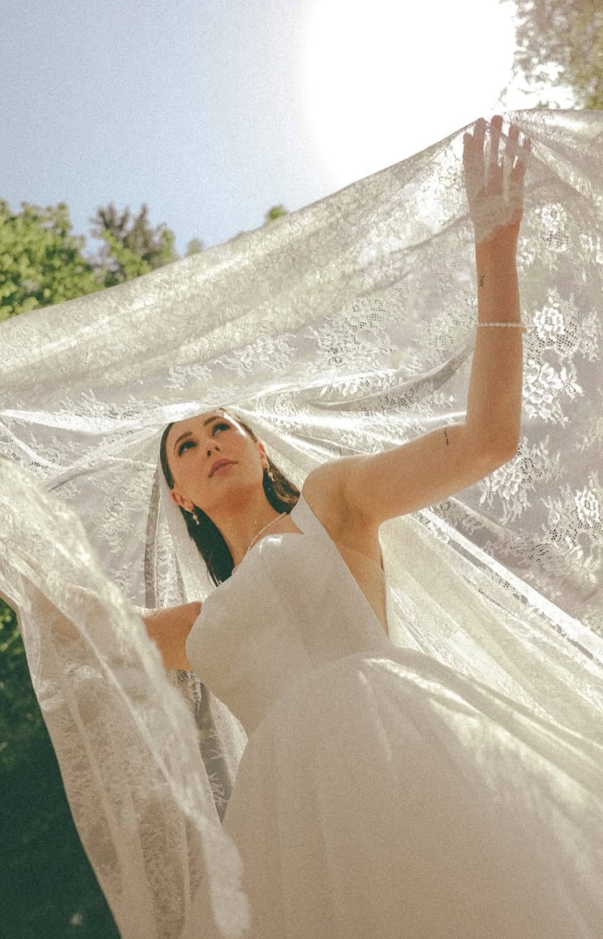 Model wearing a white dress