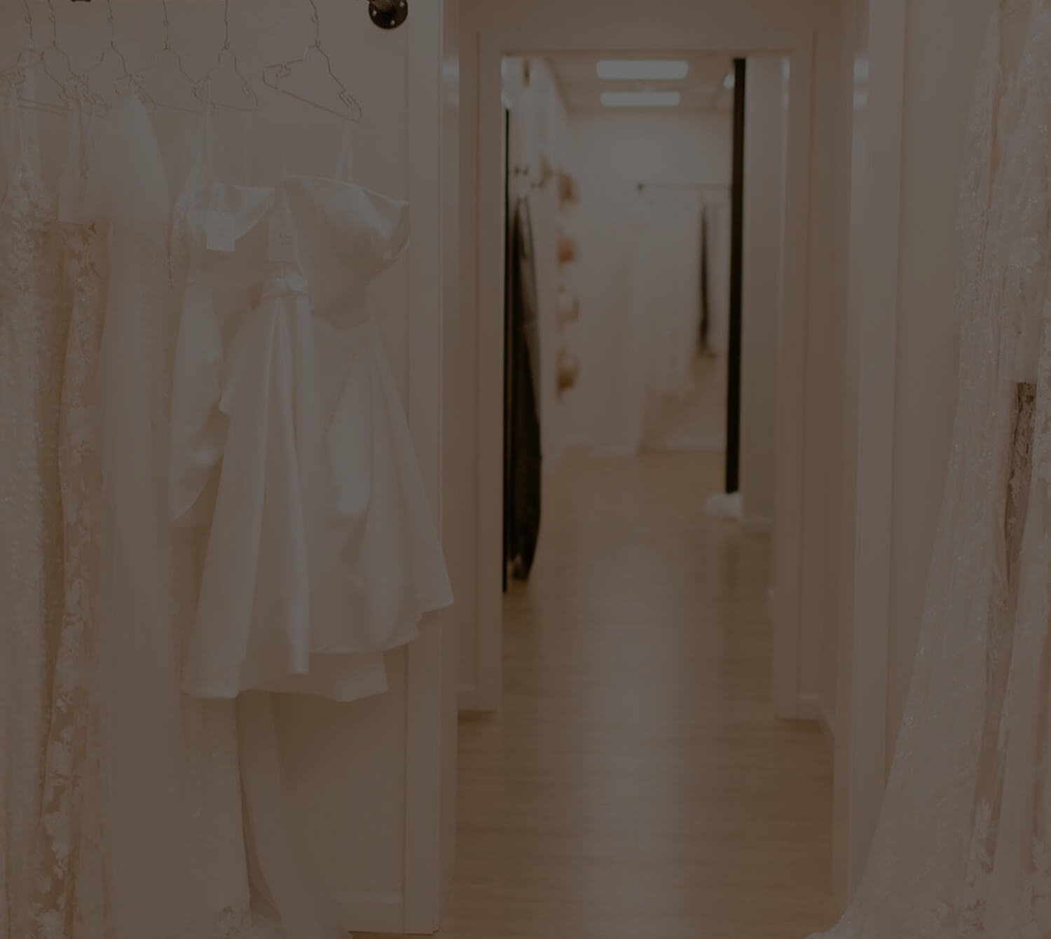 Model wearing a bridal whate dress. Mobile image