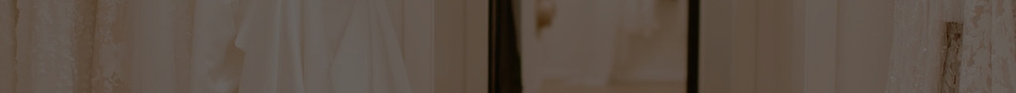 Model wearing a bridal whate dress